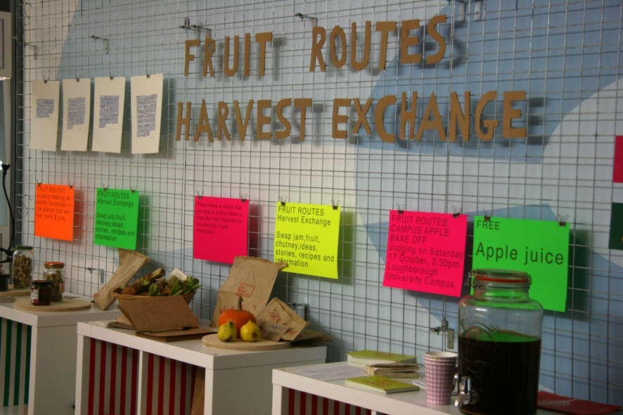 Shop display with a sign "Fruit Routes' Harvest Exchange""